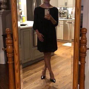 Black cocktail dress with low back & 3/4 sleeves